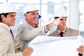 Architect explaining the project to the team on the field