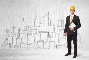 Construction worker with cityscape background drawing